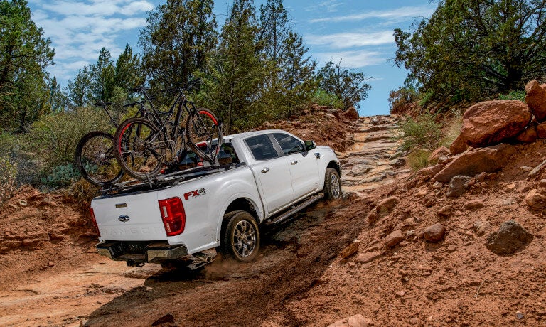 Ford Ranger offroading with bicycles in back